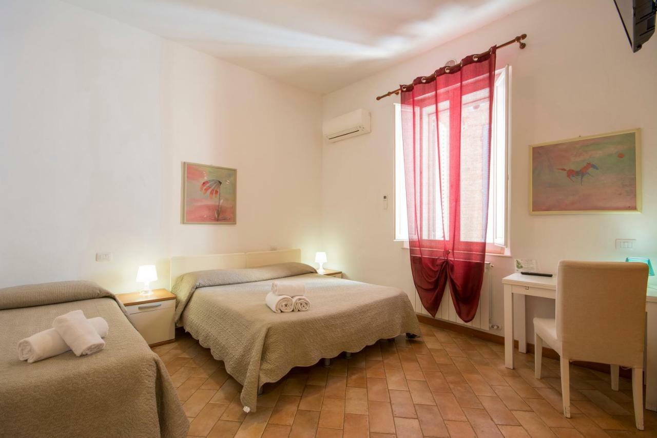 Gh Paradiso - Apartments Siena Buitenkant foto
